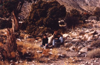 Marty and Page taking a break in the shade of junipers